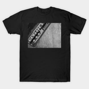 Top down view of wooden flute in a case T-Shirt